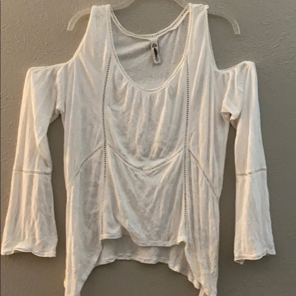 Peek a boo shoulder blouse.